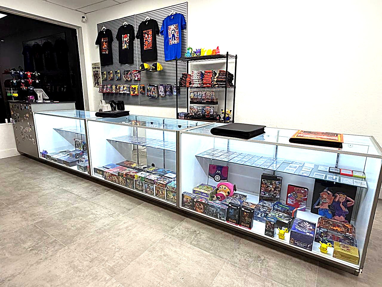 Display cases and the Pokémon shirt & product wall