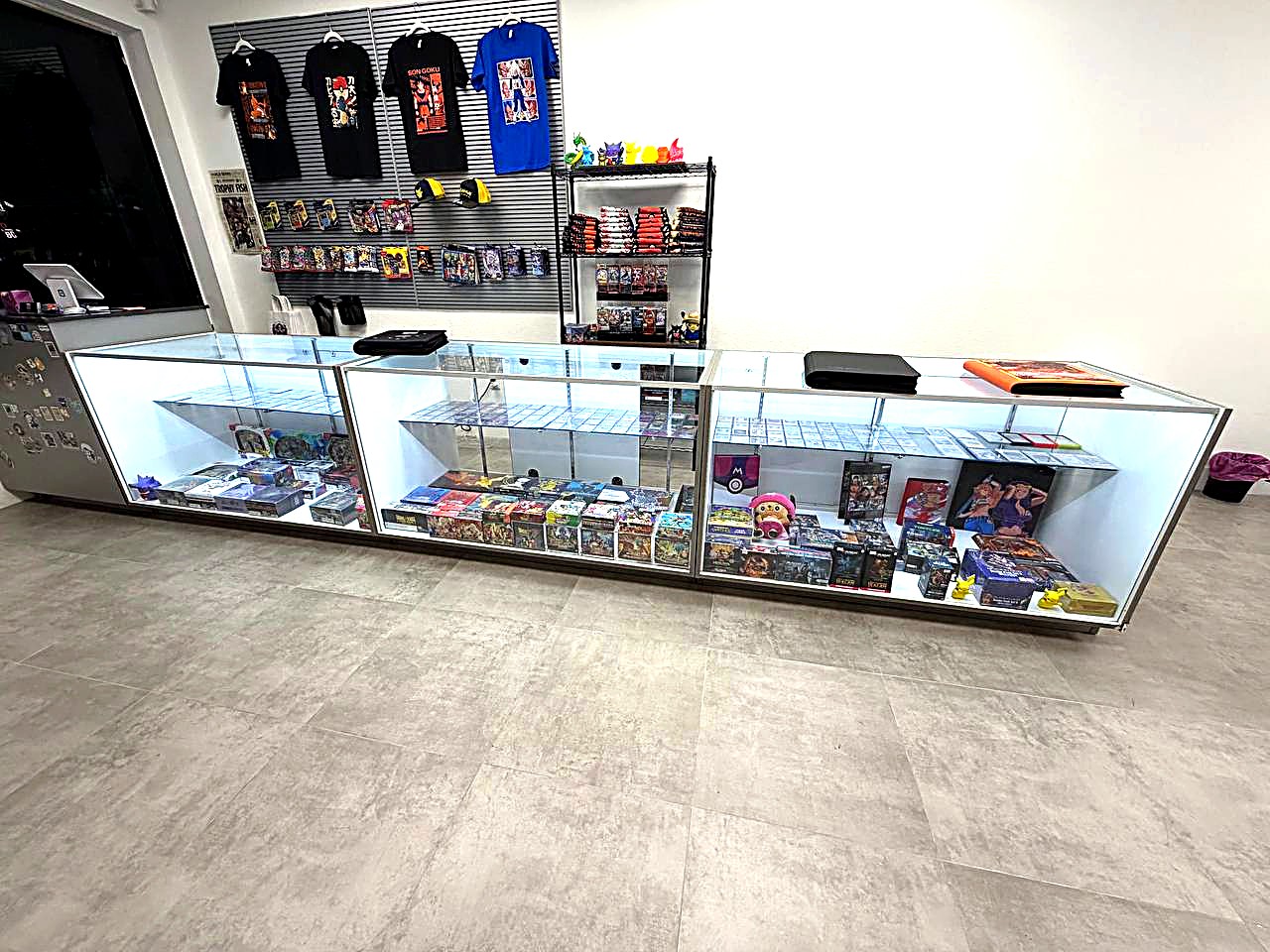 Display case with Funko Pops and figures